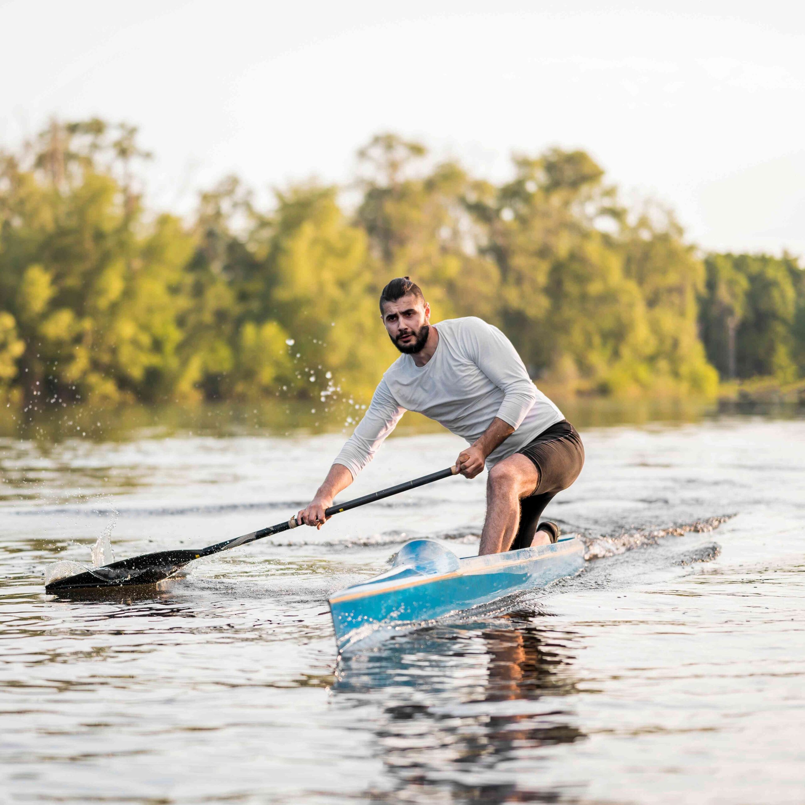 rowing-concept-with-man-canoe_11zon