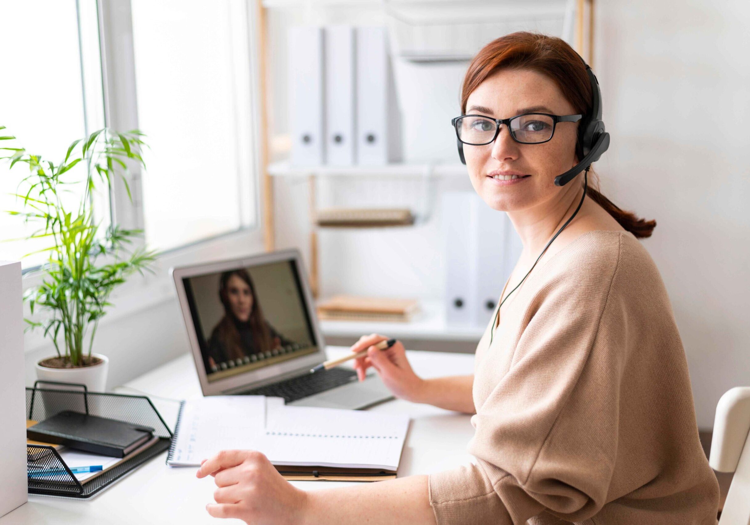 portrait-woman-work-having-video-call-laptop_11zon